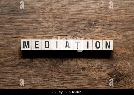 Mediation - word concept on building blocks, text, letters Stock Photo