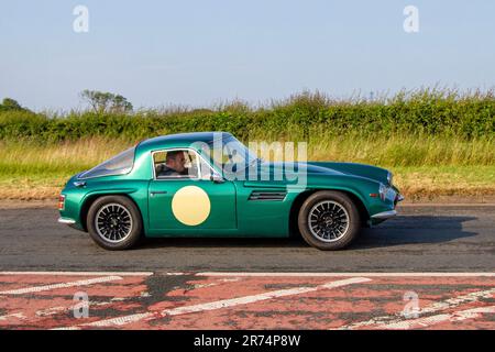 1970 70s seventies Green Blackpool built British TVR Vixen coupe;  at the Classic & Performance Motor Show at Hoghton Tower; Supercar Showtime June 2023 Stock Photo