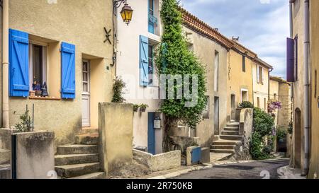 Village street in Bages. . The commune is located in the Regional Natural Park Narbonnaise en Méditerranée. Stock Photo