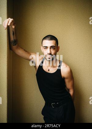 Man, short-haired, three-day beard, wall, lean, casual, Stock Photo