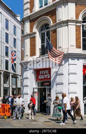 Five Guys restaurant in Long Acre, Covent Garden. Stock Photo