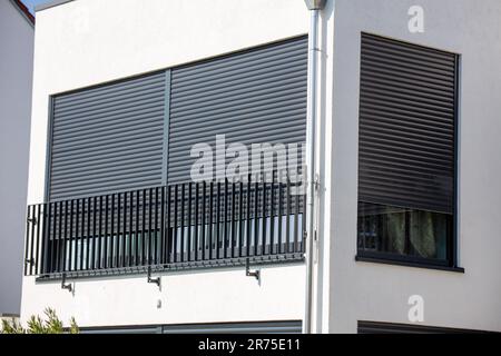 Electric aluminium roller shutter on a new residential building Stock Photo