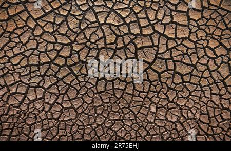 Cracked Earth Pattern Texture as Natural Abstract Background Stock Photo
