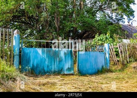 Beautiful old gate from abandoned house in village on natural background, photography consisting of old gate for house to village, old gate out villag Stock Photo