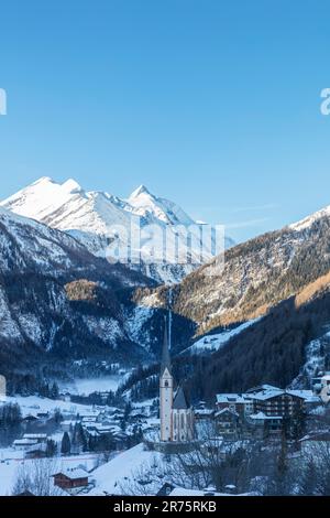 Heiligenblut am Großglockner in winter, snow, church St. Vinzenz in the center Stock Photo