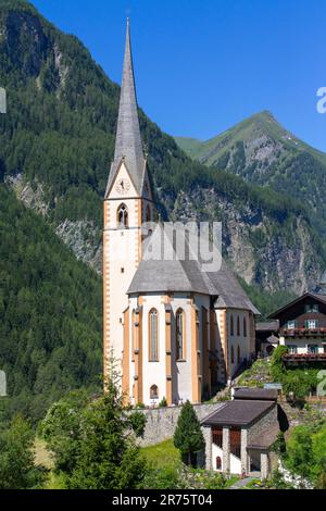 Parish church St.Vinzenz, Heiligenblut am Großglockner, daytime, summer, blue sky Stock Photo