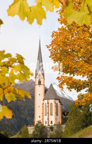 Parish church St.Vinzenz, Heiligenblut am Großglockner, daytime, autumn, fair weather Stock Photo