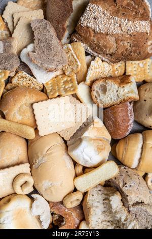 Italy, large amount of stale bread in different formats, food waste, uneaten food Stock Photo