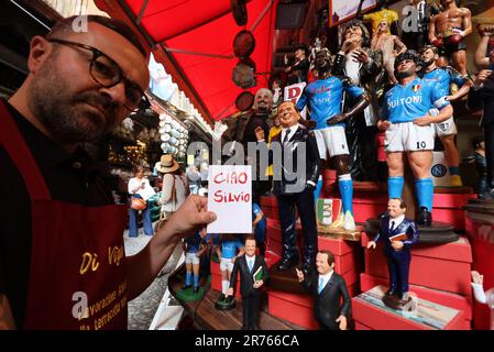 Naples, Italy. 13th June, 2023. Hello Silvio in Naples the statue of Di Virgilio to greet Berlusconi in San Gregorio Armeno Editorial Usage Only Credit: Independent Photo Agency/Alamy Live News Stock Photo