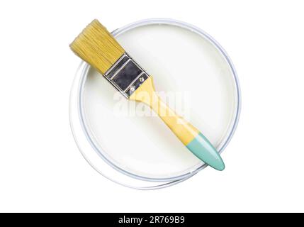 Tin of white paint with paintbrush isolated on white background - top view photo Stock Photo