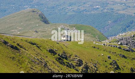 Snowdon Mountain Railway a single carriage funicular railway taking climbers and tourists from Llanberis to the summit of Yr Wyddfa Snowdonia Wales UK Stock Photo