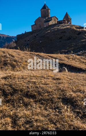 the breathtaking Kazbegi Castle located in the Mtskheta-Mtianeti region of Georgia, with a majestic mountain Stock Photo