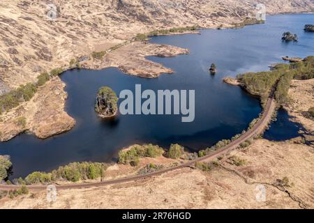 Aerial view over  lake Loch Eilt with island Dumbledore's Grave, scottisch highland, Scotland, UK Stock Photo