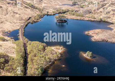 Aerial view to the west over  lake Loch Eilt with island Dumbledore's Grave, scottisch highland, Scotland, UK Stock Photo