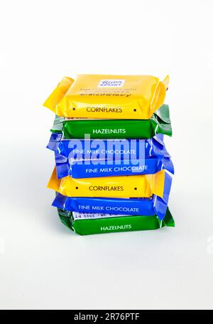 Ho Chi Minh City, Vietnam - June 13, 2023: Stack of mini chocolate bars of various flavors with Ritter Sport logo, isolated on white. A lot of candy o Stock Photo