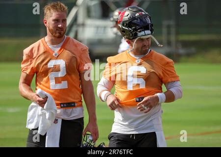 Tampa Bay Buccaneers quarterback Kyle Trask (2) throws as quarterbacks  coach Clyde Christensen watches during the first half of a preseason NFL  football game against the Miami Dolphins, Saturday, Aug. 13, 2022