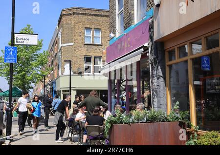 Clapton is being gentrified, as here on Chatsworth Road with a vibrant cafe & coffee culture, indie shops & a Sunday market, in east London, UK Stock Photo