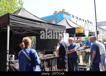 Clapton is being gentrified, as here on Chatsworth Road with a vibrant cafe & coffee culture, indie shops & a Sunday market, in east London, UK Stock Photo