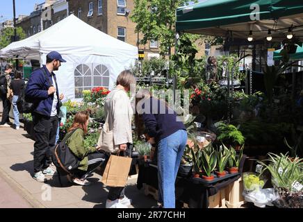 Clapton is being gentrified, as here on Chatsworth Road with a vibrant cafe & coffee culture, indie shops & a Sunday market, in east London, UK Stock Photo