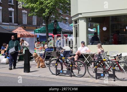 Clapton is being gentrified, as here on Chatsworth Road with a vibrant cafe & coffee culture, indie shops & a Sunday market, in east London, UK Stock Photo