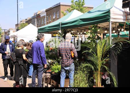 Clapton is being gentrified, as here on Chatsworth Road with a vibrant cafe & coffee culture, indie shops & a Sunday market, in east London, UK Stock Photo