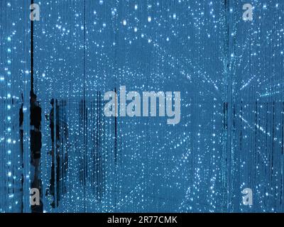 teamLab Planets, Tokyo: a room full of strings of LED lights, mirrored ...