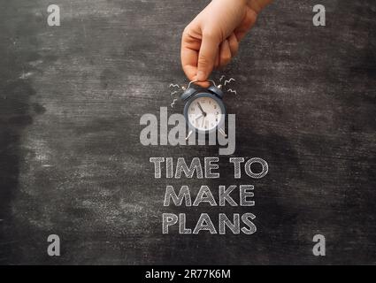 text time to make plans on a blackboard with chalk Stock Photo