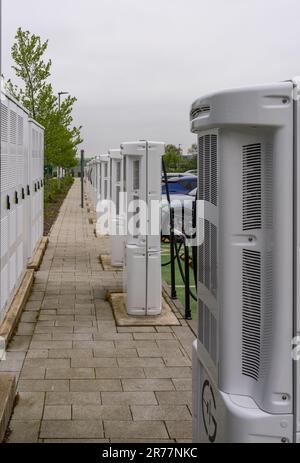 Midlands, UK - 13 May 2023: Rear view of electric car charging points on motorway Stock Photo