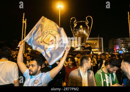 English football fans celebrating Manchester City victory over Inter in UEFA Champions League final in Istanbul Turkey. Taksim square Stock Photo