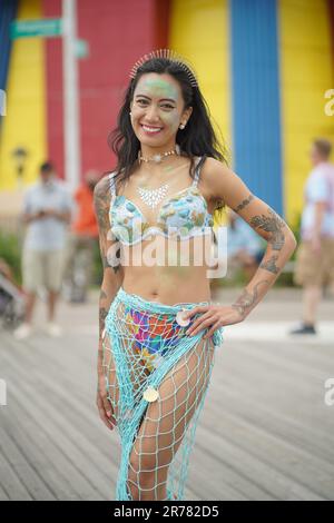NEW YORK - JUNE 18, 2022: Participant posing during the 40th Annual Mermaid Parade at Coney Island, the largest parade in the nation and a celebration Stock Photo