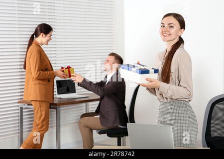 Christmas gift from colleague. Tradition giving gifts. Businessman excited  face hold gift box. Secret santa office tradition. Celebrate christmas  corporate party. Man formal suit hold gift box Stock Photo - Alamy