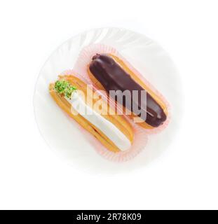 close up shot of two eclairs, isolated on white Stock Photo