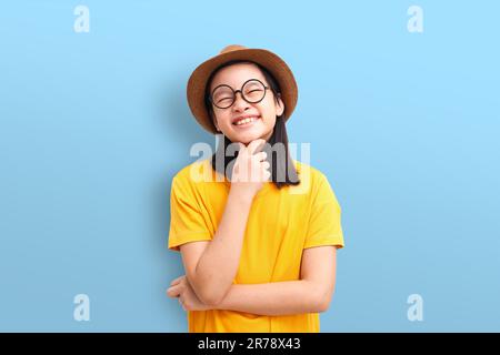 The little girl had an extremely happy smile on her face. She has a positive attitude and sense of humor. Stock Photo