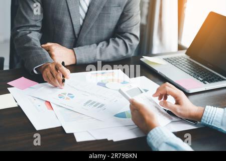 Business team collaboration discussing working analyzing with financial data and marketing growth report graph in team, presentation and brainstorming Stock Photo