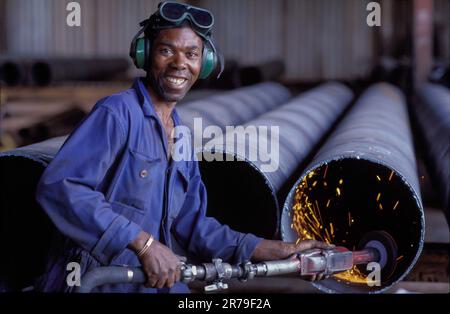 Zambia, Ndola factoryworker is welding pipes in the Hudson metalindustry factory. Stock Photo