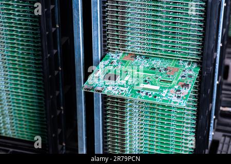 Electronics Manufacturing Services, Assembly Of Circuit Board arrangement, close-up of the raw of PCBA in tray. Circuit board with electronic componen Stock Photo