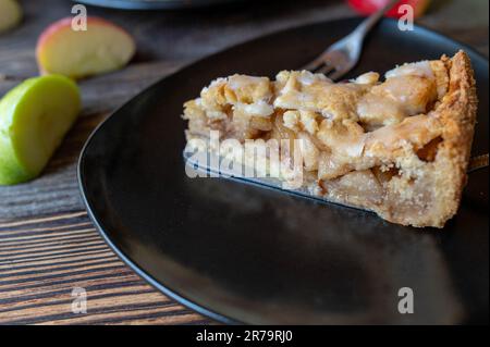 Piece of apple pie on a plate Stock Photo