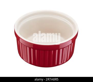 Red round empty porcelain ramekin on a white background Stock Photo
