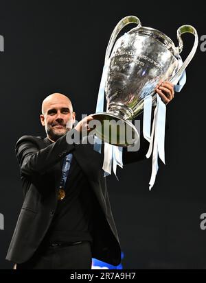 ISTANBUL, TURKEY - JUNE 10: manager Pep Guardiola of Manchester City  kissing trophy during the UEFA Champions League 2022/23 final match between  FC In Stock Photo - Alamy