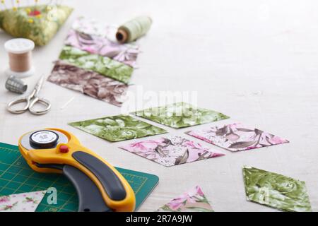 Quilt sewing process. Sewing and quilting accessories. Stock Photo