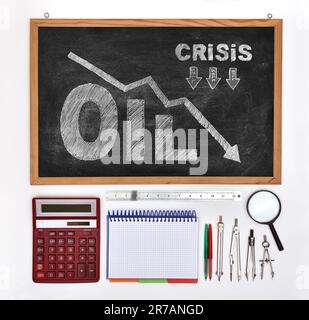 black board with drawing crisis oil chart and business elements Stock Photo