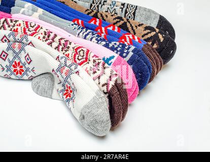 Warm wool socks folded on white background Stock Photo