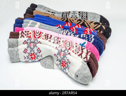 Warm wool socks folded on white background Stock Photo