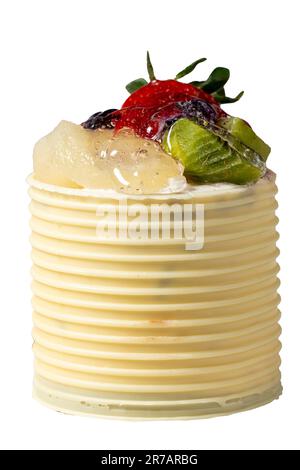 Cream cake surrounded by chocolate. Chocolate and fruit cake isolated on white background. Studio shoot. Bakery products. Close up Stock Photo