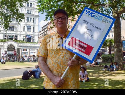 London, England, UK. 14th June, 2023. Screenwriter RUSSELL T DAVIES joins the rally as UK screenwriters and Writers' Guild Of Great Britain (WGGB) members gather in Leicester Square in solidarity with striking screenwriters in the USA. (Credit Image: © Vuk Valcic/ZUMA Press Wire) EDITORIAL USAGE ONLY! Not for Commercial USAGE! Stock Photo