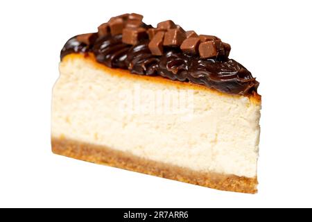 Chocolate cheesecake isolated on white background. Delicious cheesecake with chocolate chips and cream. Close up Stock Photo