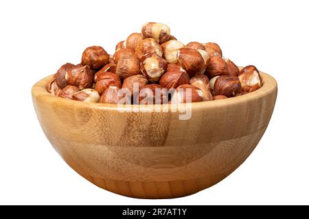 Hazelnut isolated on white background. Peeled hazelnuts in wooden bowl. Superfood. Vegetarian food concept. Healthy snacks Stock Photo