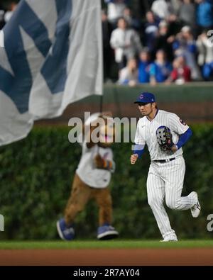 Chicago Cubs' Seiya Suzuki stretches and watches batting practice before a  baseball game against the Baltimore Orioles Wednesday, July 13, 2022, in  Chicago. (AP Photo/Charles Rex Arbogast Stock Photo - Alamy