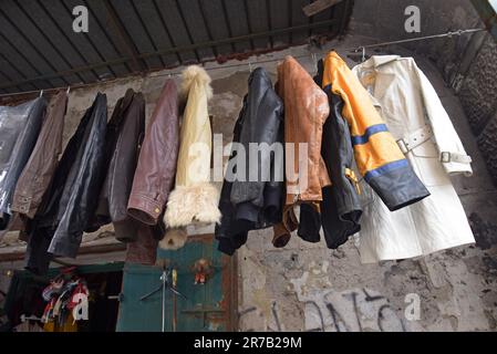 A big selection of leather jackets on sale in the vintage and retro clothes market of Pugliano, in Ercolano, Naples, Italy Stock Photo