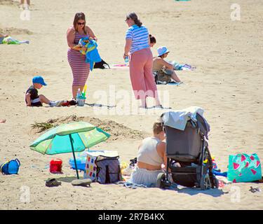 Ayr, Scotland, UK 14th June, 2023. UK Weather:  Hot Ayr beach saw tourists and locals  enjoy the sands.  Credit Gerard Ferry/Alamy Live News Stock Photo